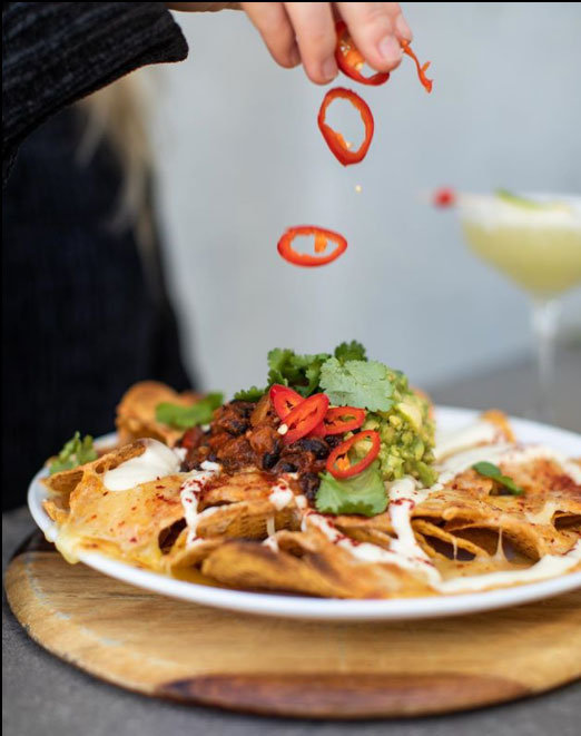 Buenos Nachos Amigos! Five Fun Facts and Restaurants to Celebrate International Nachos Day.