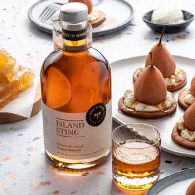 Set Tongues Abuzz with this Honey Bubbles Cocktail Recipe Using Island Sting Liqueur.