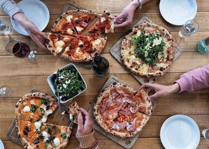Cheese the Day – Check Out the Origins and Traditions of Pizza at these Five Restaurants.