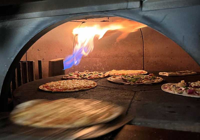 Stoke the Culinary Flames at these 4 Wood-fired Pizza Joints