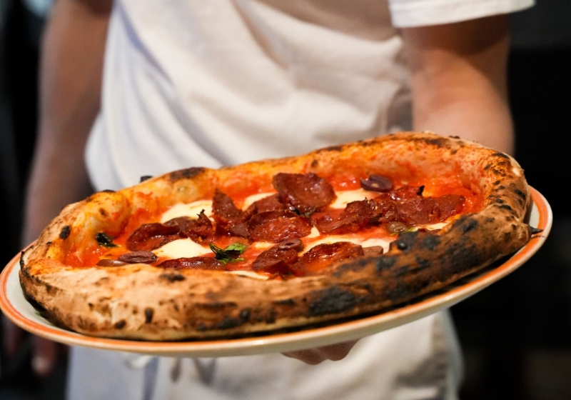 Savour Authentic Italian Flavours: Wood-Fired Pizza and Timeless Culinary Traditions