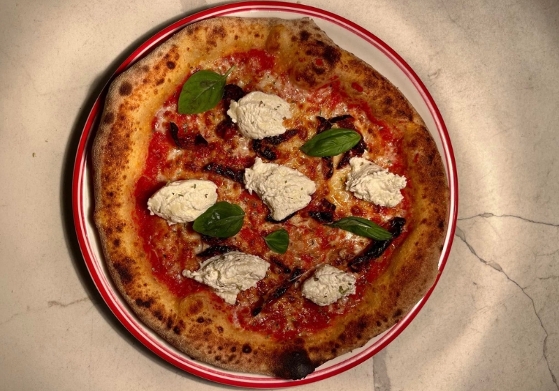 Savour Authentic Italian Flavours: Wood-Fired Pizza and Timeless Culinary Traditions