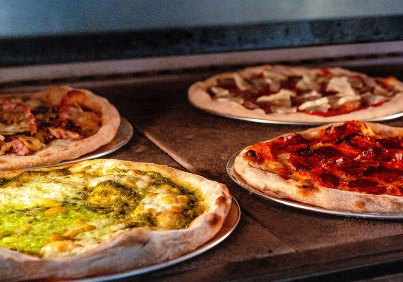 Wood-Fired Pizzas: Where to Find the Perfect Slice