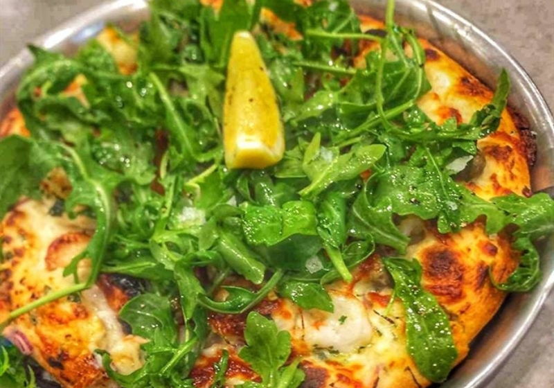 The Best Artisan Pizza Spots to Indulge in Right Now