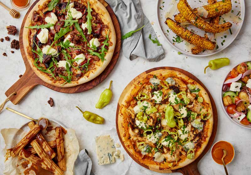 Slice, Slice Baby: Free Pizza and Feel-good Vibes at Divide 8’s Annual Fundraiser