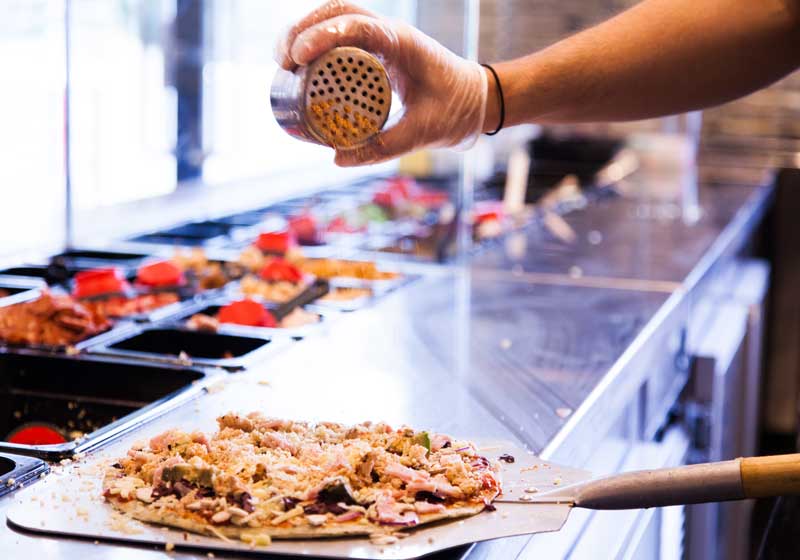 A Pizza the Action: How One Family Turned a Dinner-time Chant Into a National Brand