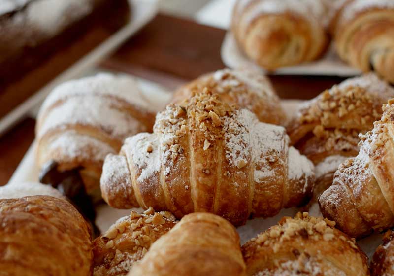 Pastry as Personality: Suburban Bakeries Redefining Cool with Cult Croissants and Caneles