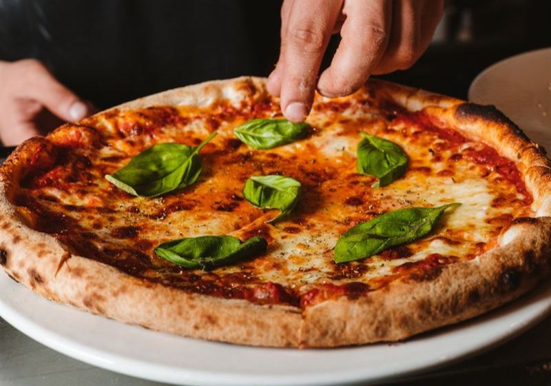 Indulge in the Art of Pizza: A Journey Through Culinary Excellence