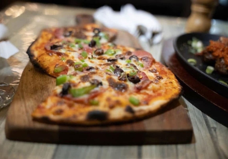 A Savoury Journey Through Australia's Best Street Food and Pizza Venues
