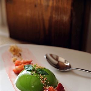Sweet Basil Panna Cotta with Macerated Strawberries and Brioche Crumbs by Stillwater