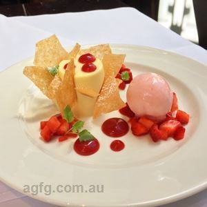 White Chocolate Panna Cotta with Marinated Strawberries, Almond Tuille and White Peach Sorbet - Chef Recipe by Andre Mahe