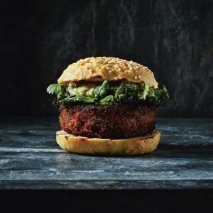 Lentil and Charcoal Roasted Carrot Burger with Roasted Kale and Green Banana Guacamole