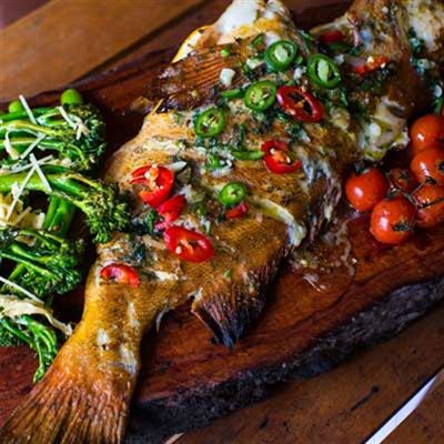 Whole Fish with Cherry Tomatoes, Broccolini and Tartar Sauce - Recipe by Kerby Brown.