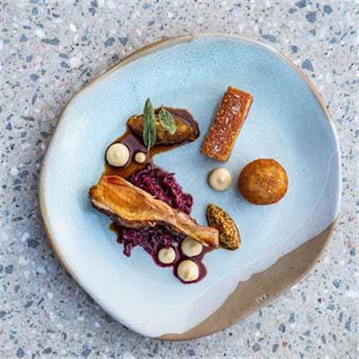 Pork, Braised Red Cabbage, Caramelised Cauliflower, Apple and Grain Mustard - Chef Recipe by Chris Norman.