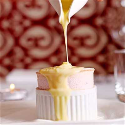 Raspberry Souffle with White Chocolate Sauce - Chef Recipe by Daniel Ridgeway